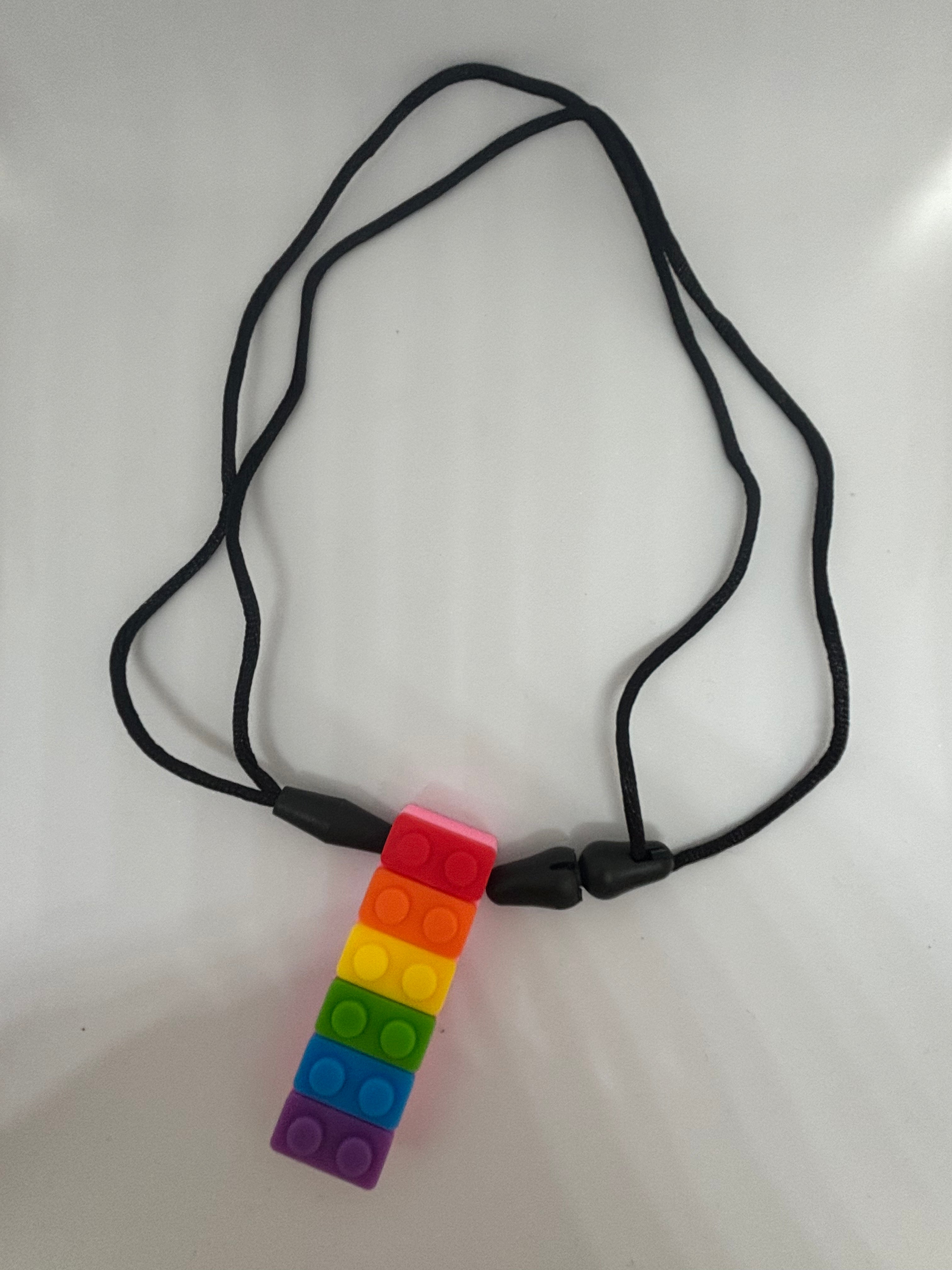 Chewable necklace - Rainbow brick – Neurotoys.co.za Chewable necklace - Rainbow brick – Neurotoys.co.za
